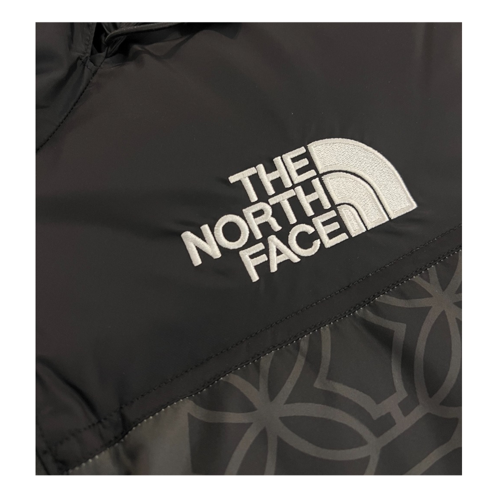 The North Face 1996 Nuptse Patterned Down Puffer Jacket in Black